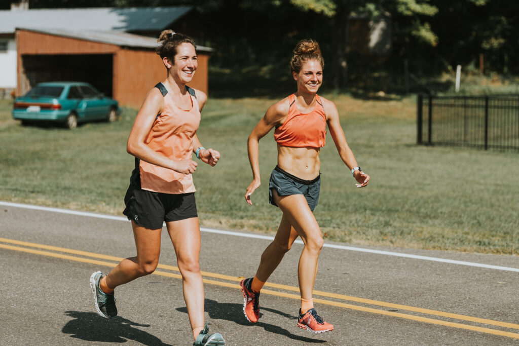 Joanna and Tristin running in the heat at ZAP practice.