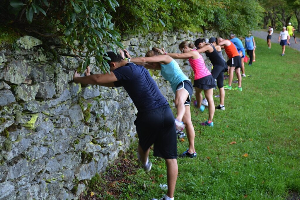 ZAP campers performing a dynamic warm-up.