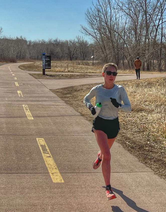 Whitney running a long run at altitude training camp.
