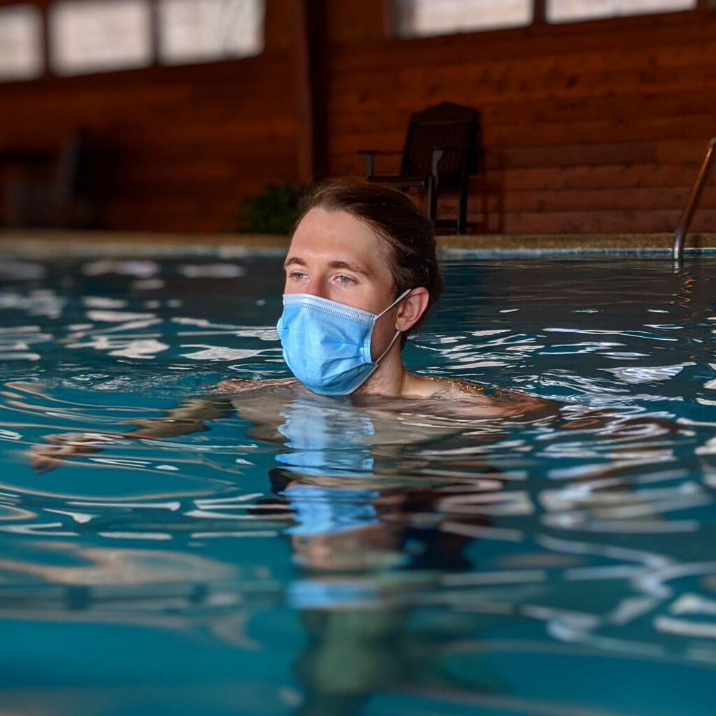 Andrew performing cross training for runners in the form of pool running.